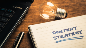 A notebook page labeled “content strategy” with a lightbulb above it.