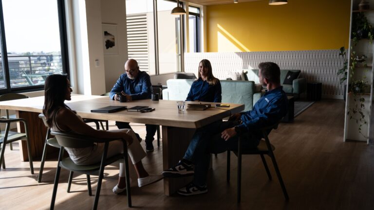 marketing team discussing SEO and AI strategies